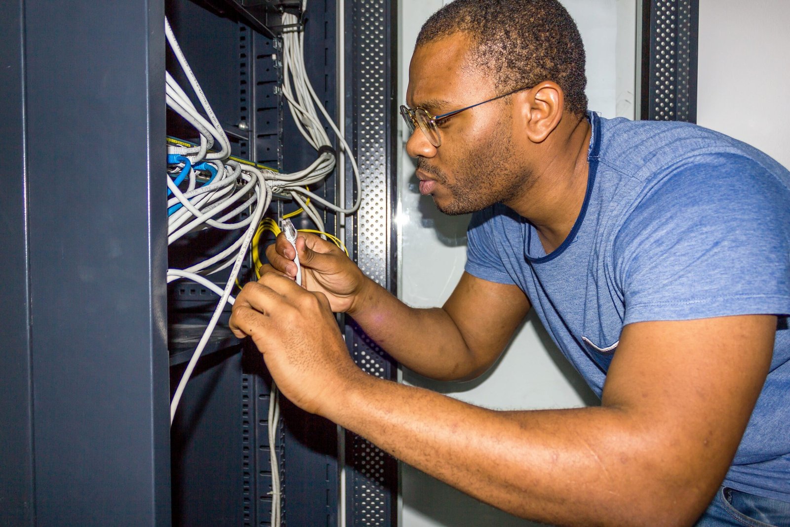 side-view-man-working-with-wires